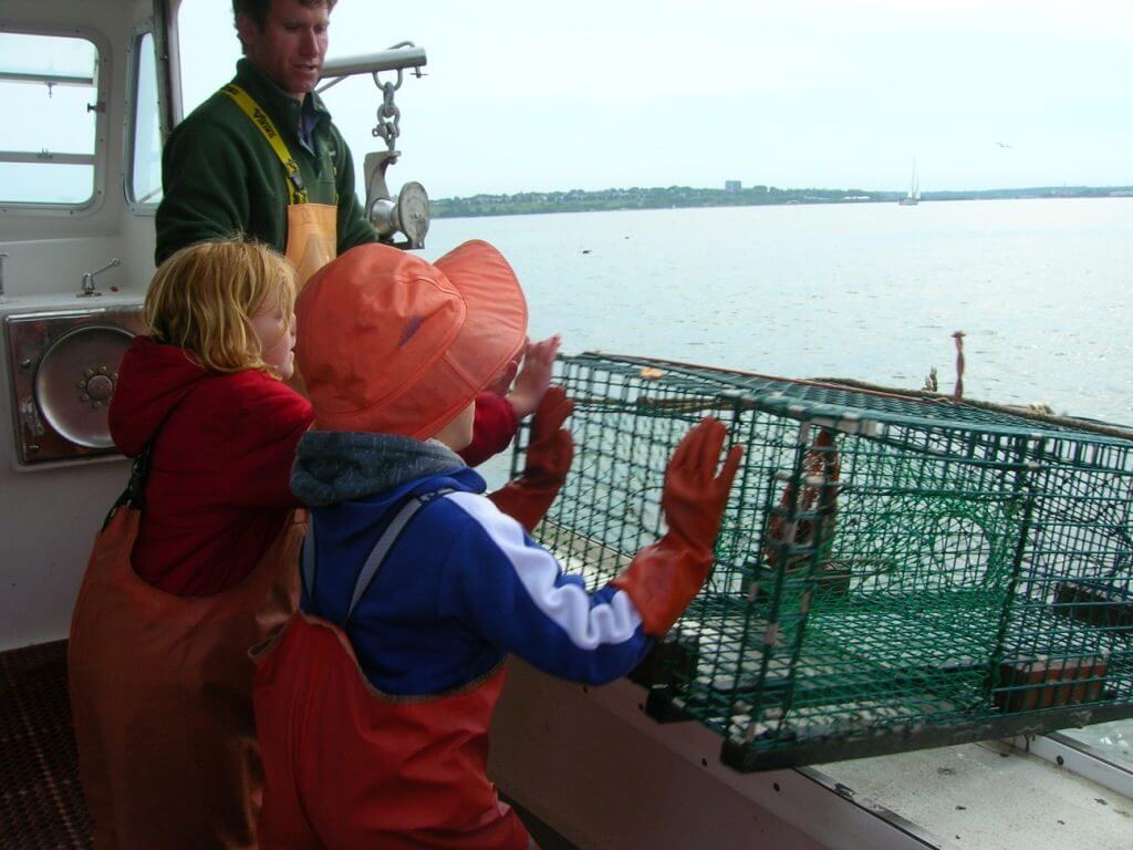 kids on a lobster boat