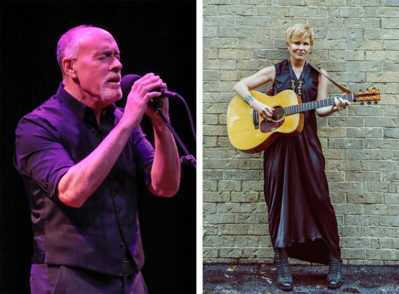 Marc Cohn singing into a microphone and Shawn Colvin playing a guitar